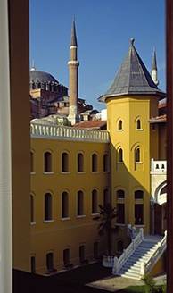 Four Seasons Hotel Istanbul at Sultanahmet > View of courtyard and Blue Mosque from only two guest rooms – foreground table-top set-up.